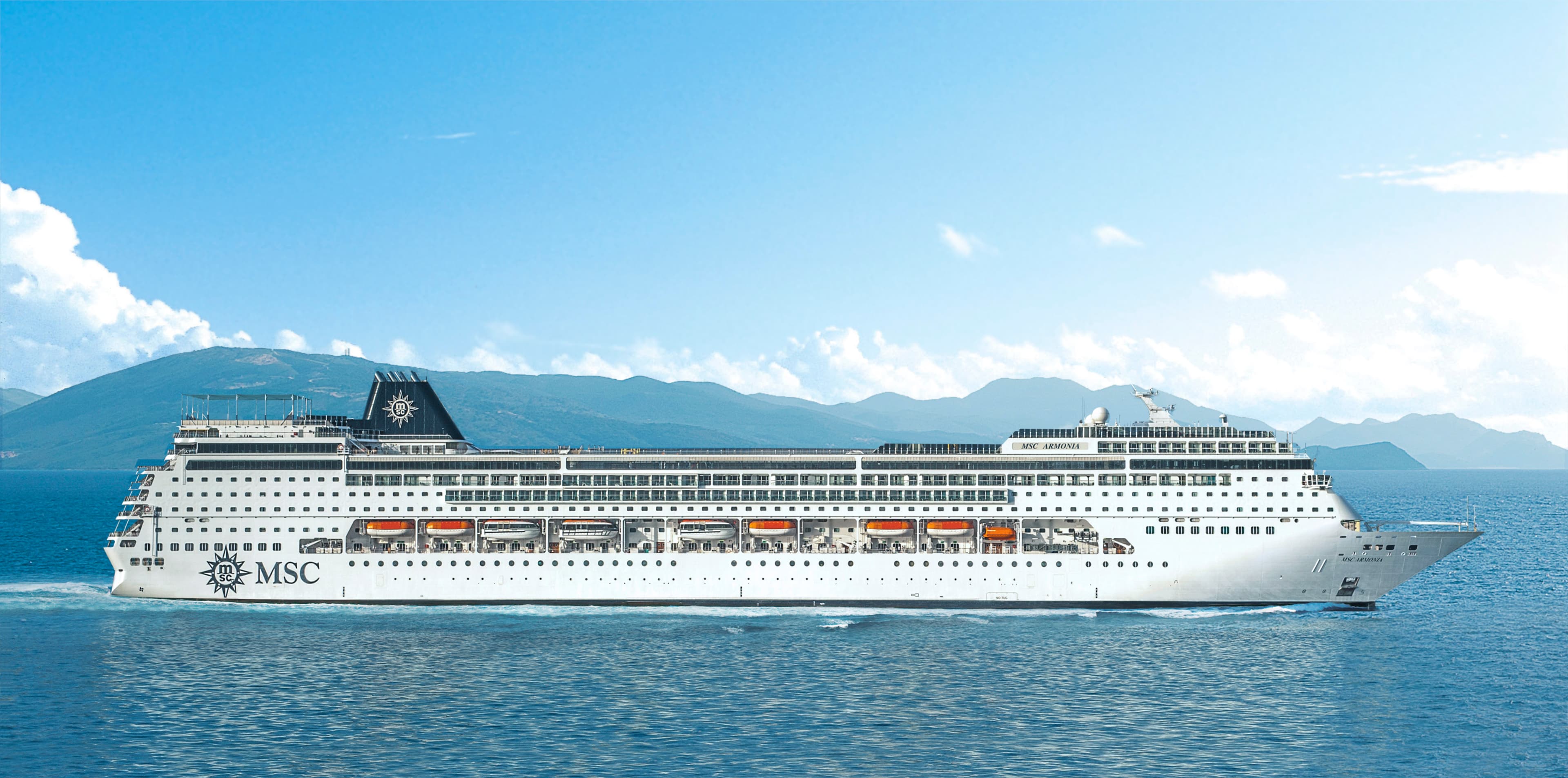 MSC Armonia sunny profile exterior underway with ARMONIA on the bow