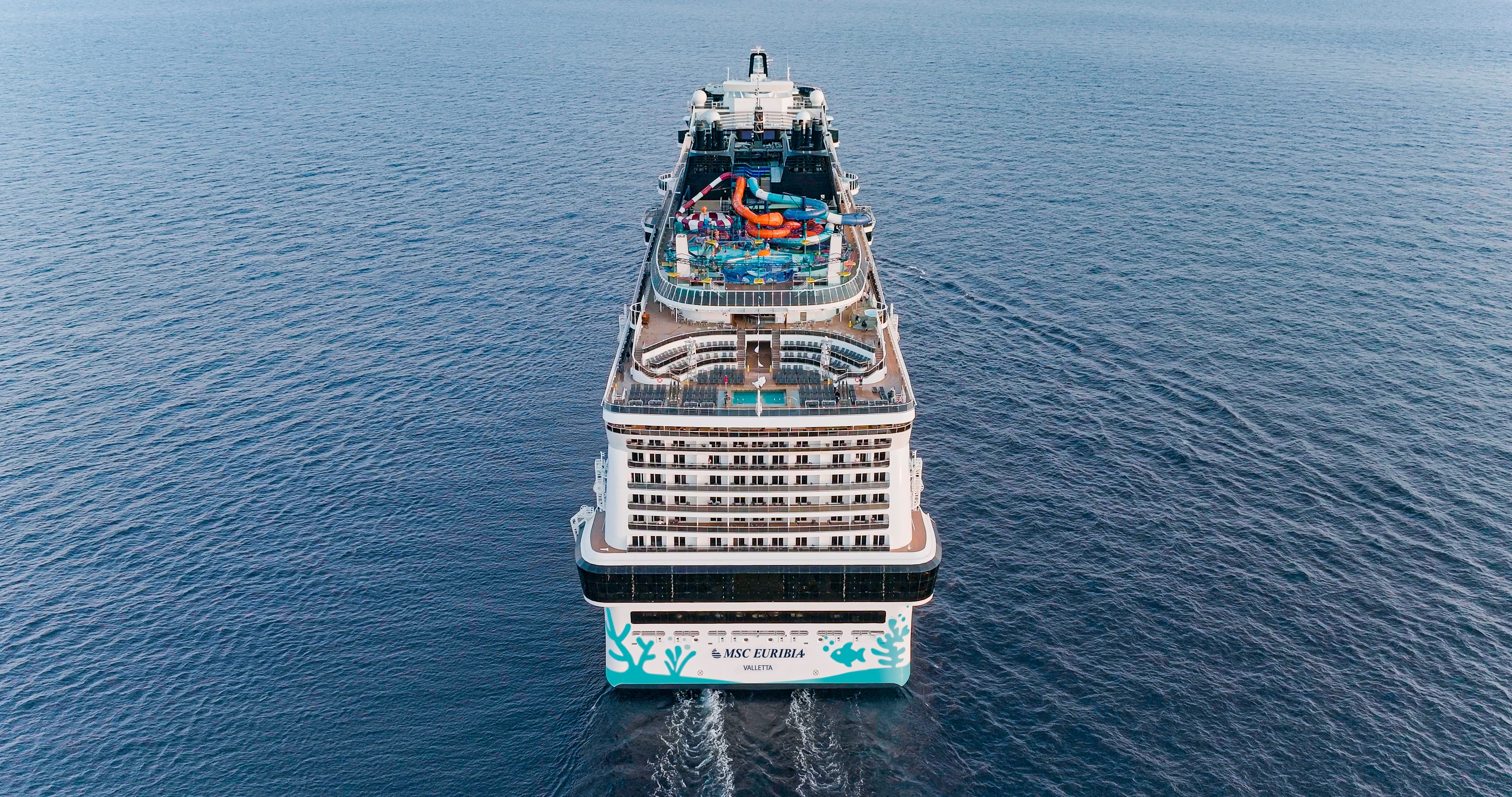 MSC Euribia stern aerial underway showing aquapark and coral hull art