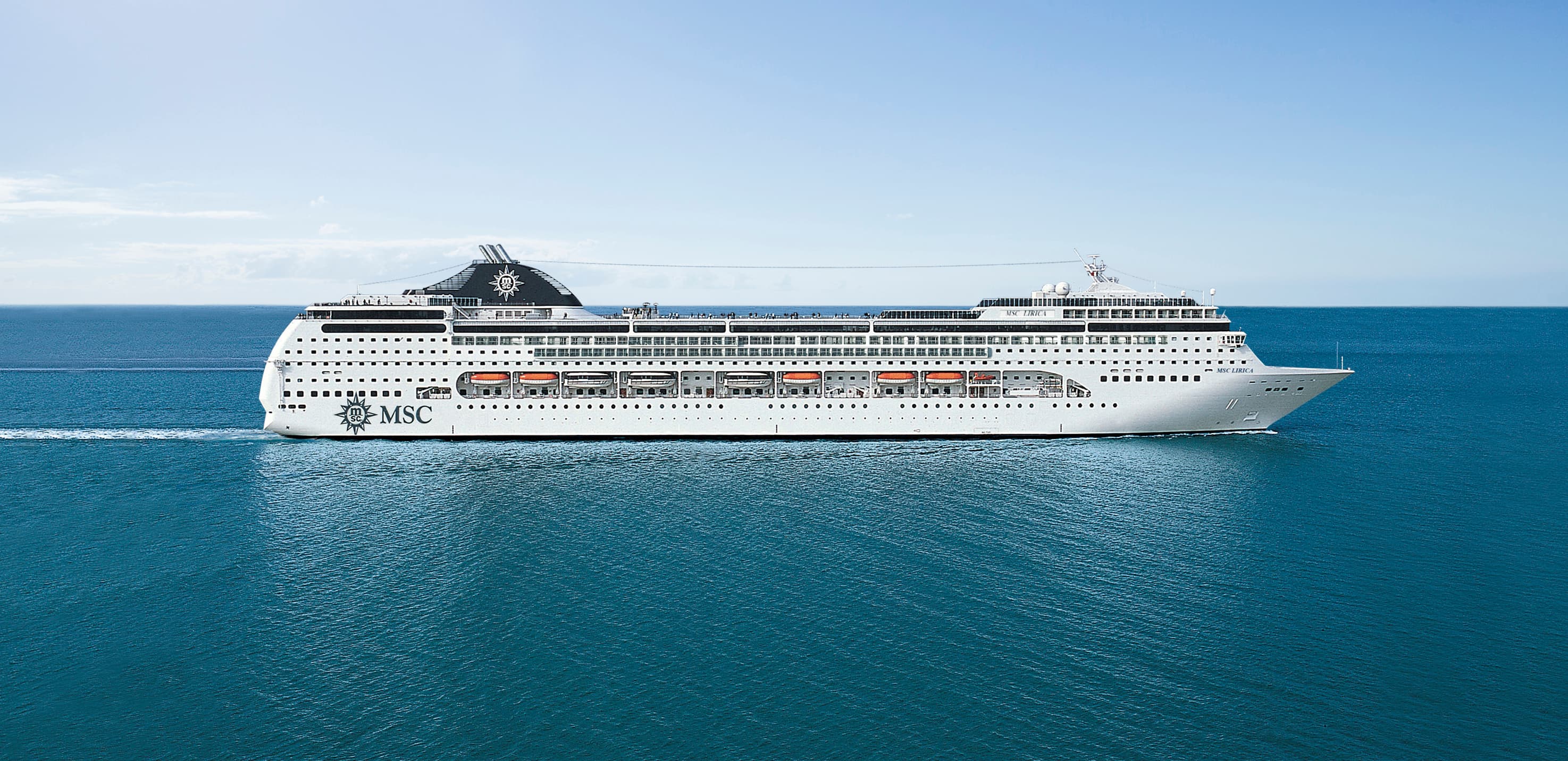 MSC Lirica sailing under clear midday sky