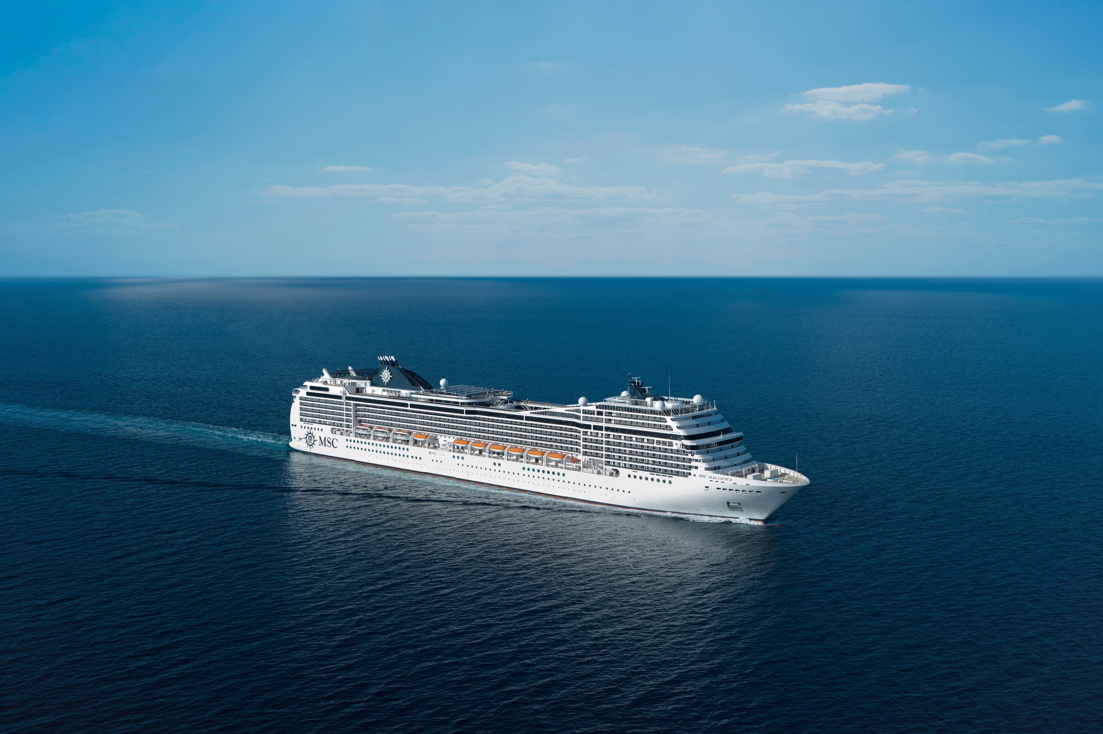 MSC Magnifica sunny aerial exterior underway on open ocean