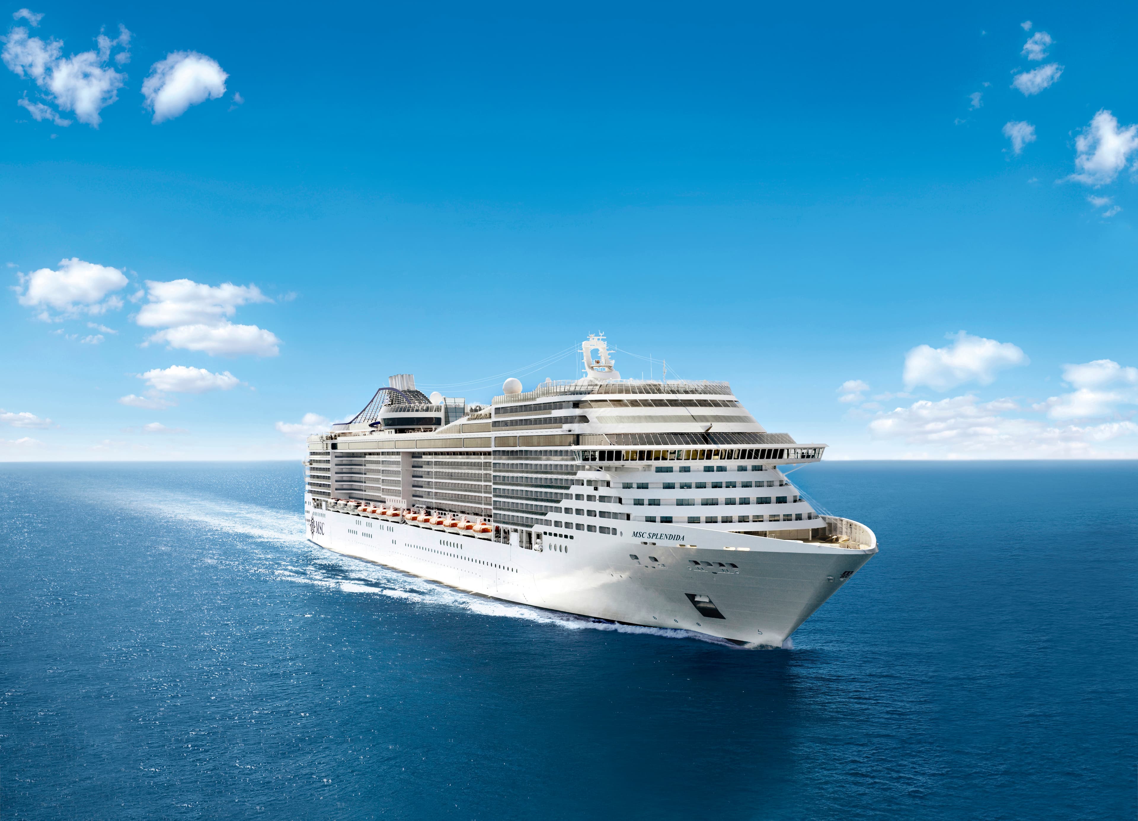 MSC Splendida starboard aerial underway under a clear blue sky